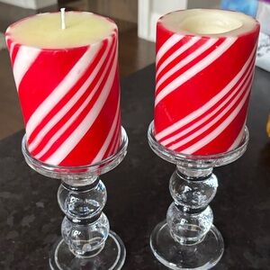 Red and White Striped Candles on Glass Holders